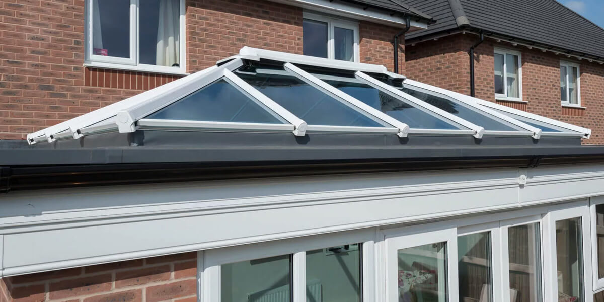 A glass roof conservatory from the outside