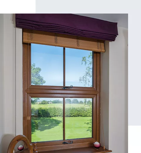 The inside of an oak coloured window