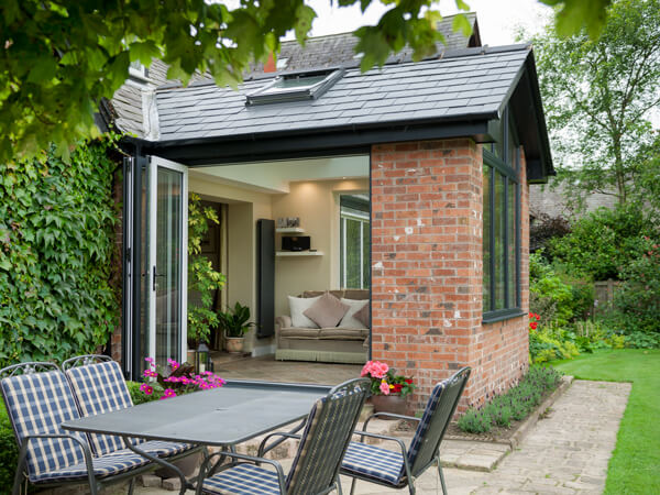 Tiled Roof Home Extension With Bi-Fold Doors